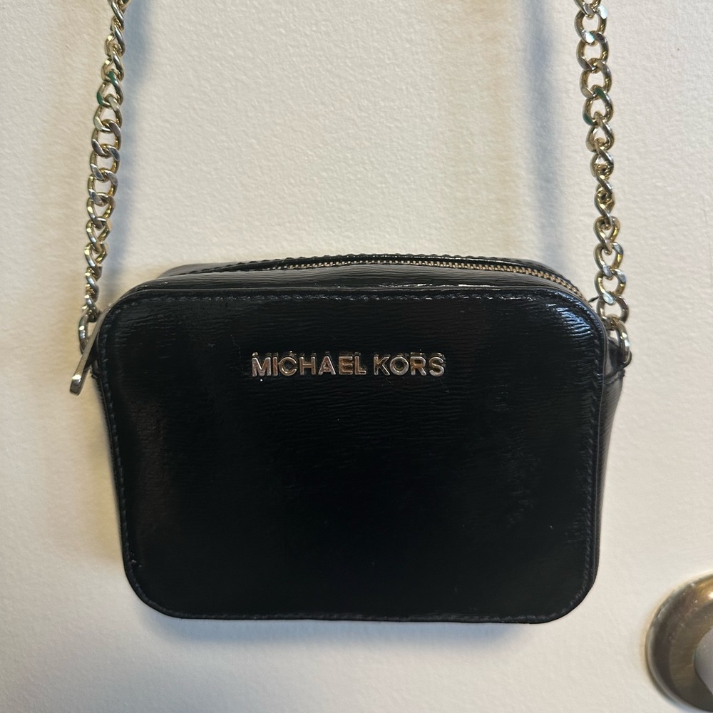 Michael Kors black patent leather crossbody bag with gold chain